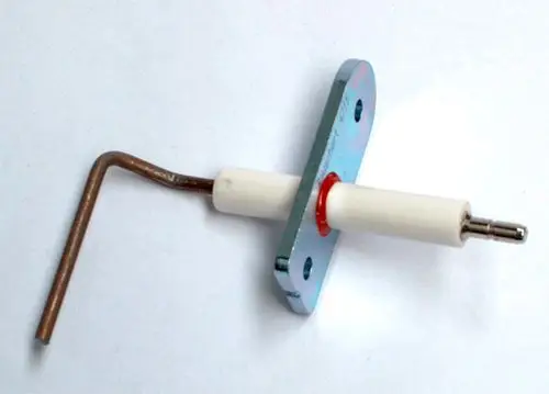 Daikin Ionisationselektrode mit Dichtung, passend für kompakte Heizgeräte. Metallische Halterung mit einer weißen Isolierung und einem abgewinkelten Anschluss.